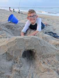 My son at the beach down from the house.