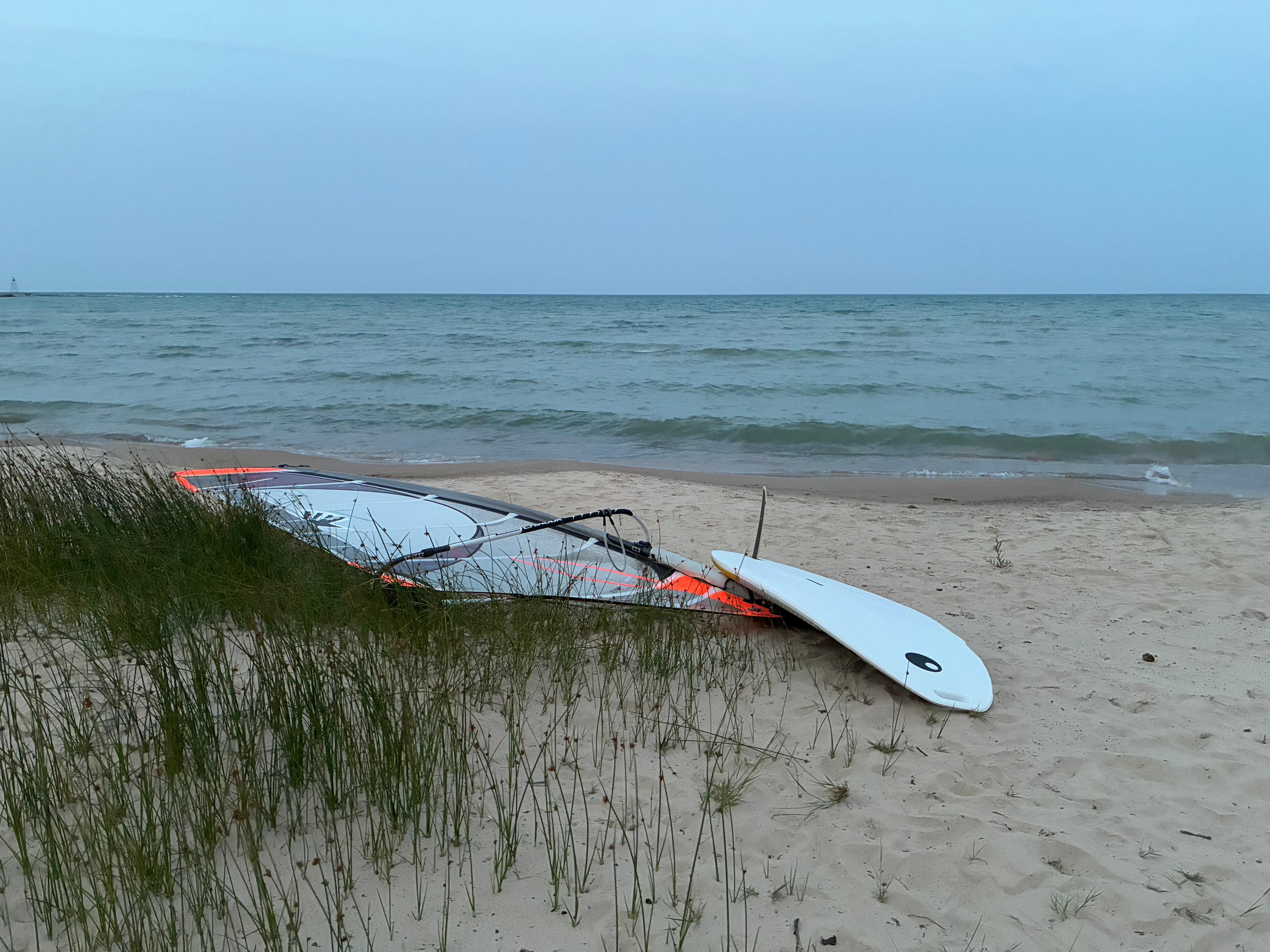 I was glad to have my windsurfer as there were a couple of breezy days for sailing. Although, a warning for board sailors, there are many large boulders along the coast in this area, … unfortunately, I broke a fin on one of them!  .