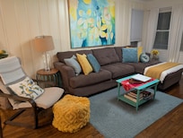 Comfy living room area with a big roomy sofa.