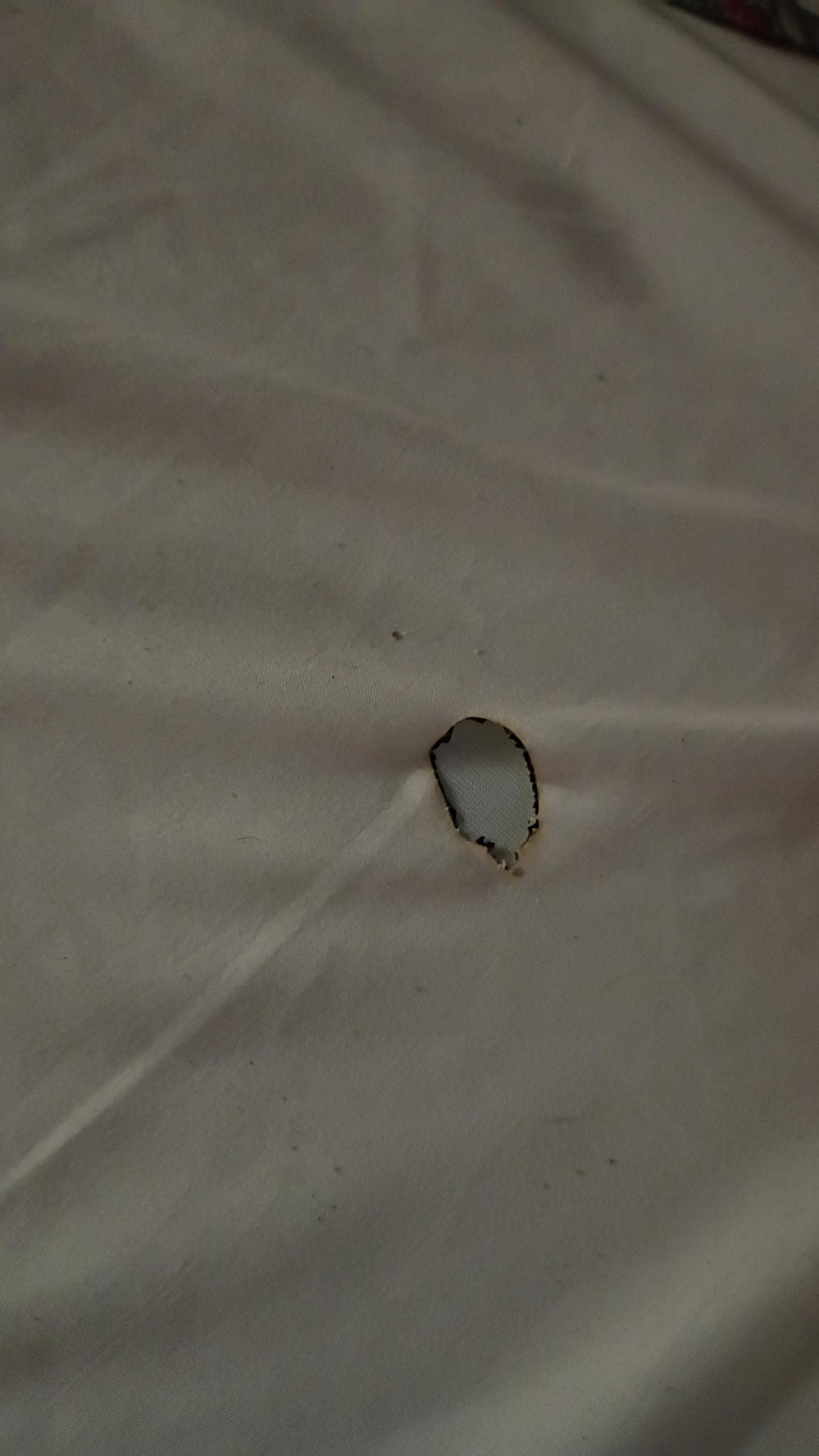 Burn hole in sheet