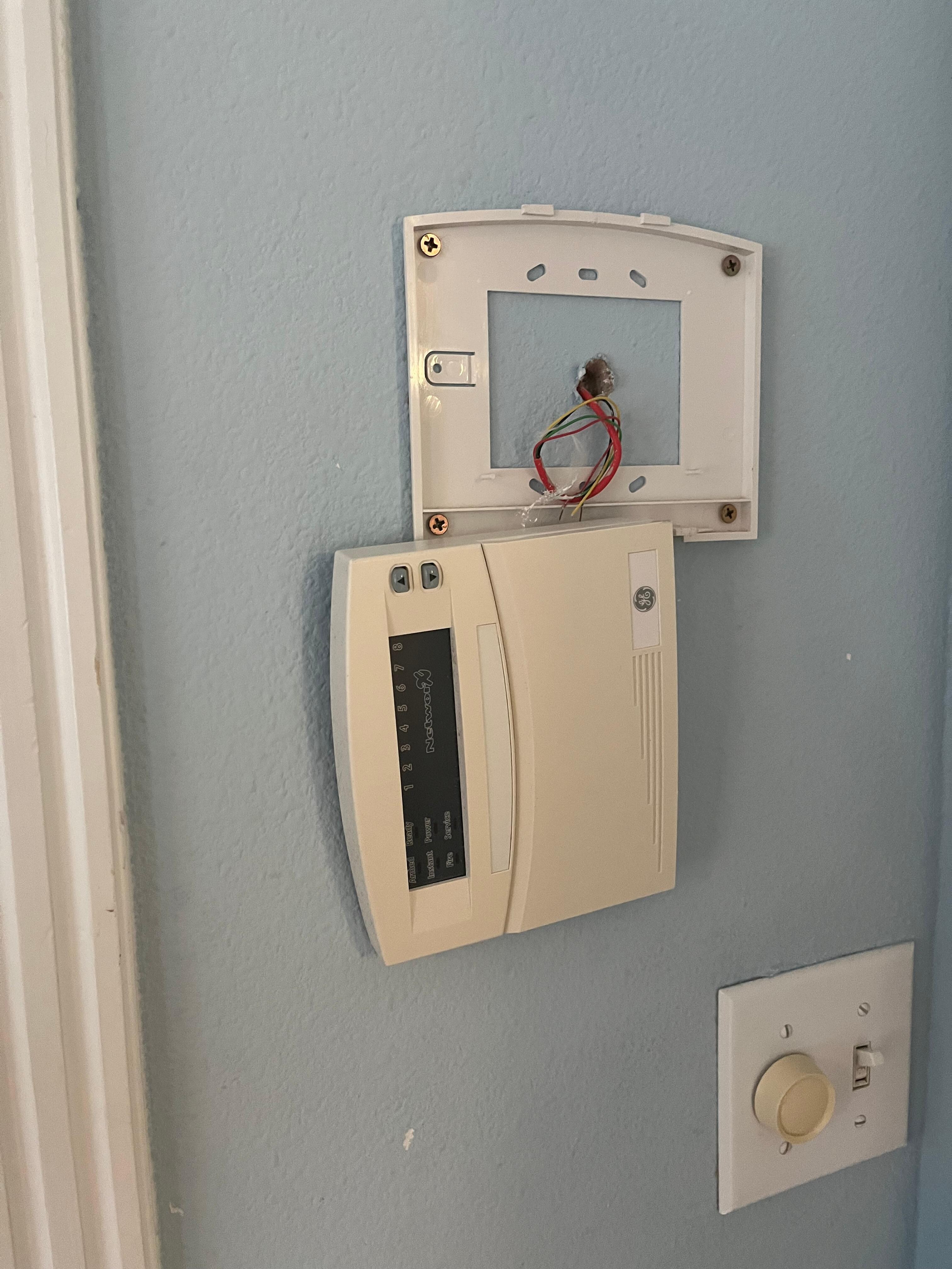 Speaker control box that doesn’t work hanging off the wall