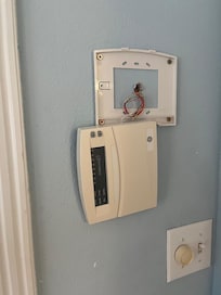 Speaker control box that doesn’t work hanging off the wall