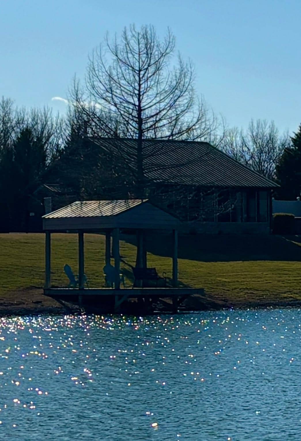 Cute, little private cabin on a stocked lake with screened porch, fire pit & hot tub.