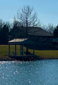 Cute, little private cabin on a stocked lake with screened porch, fire pit & hot tub.