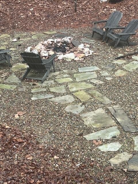 fire pit is untidy; furniture needs re-staining