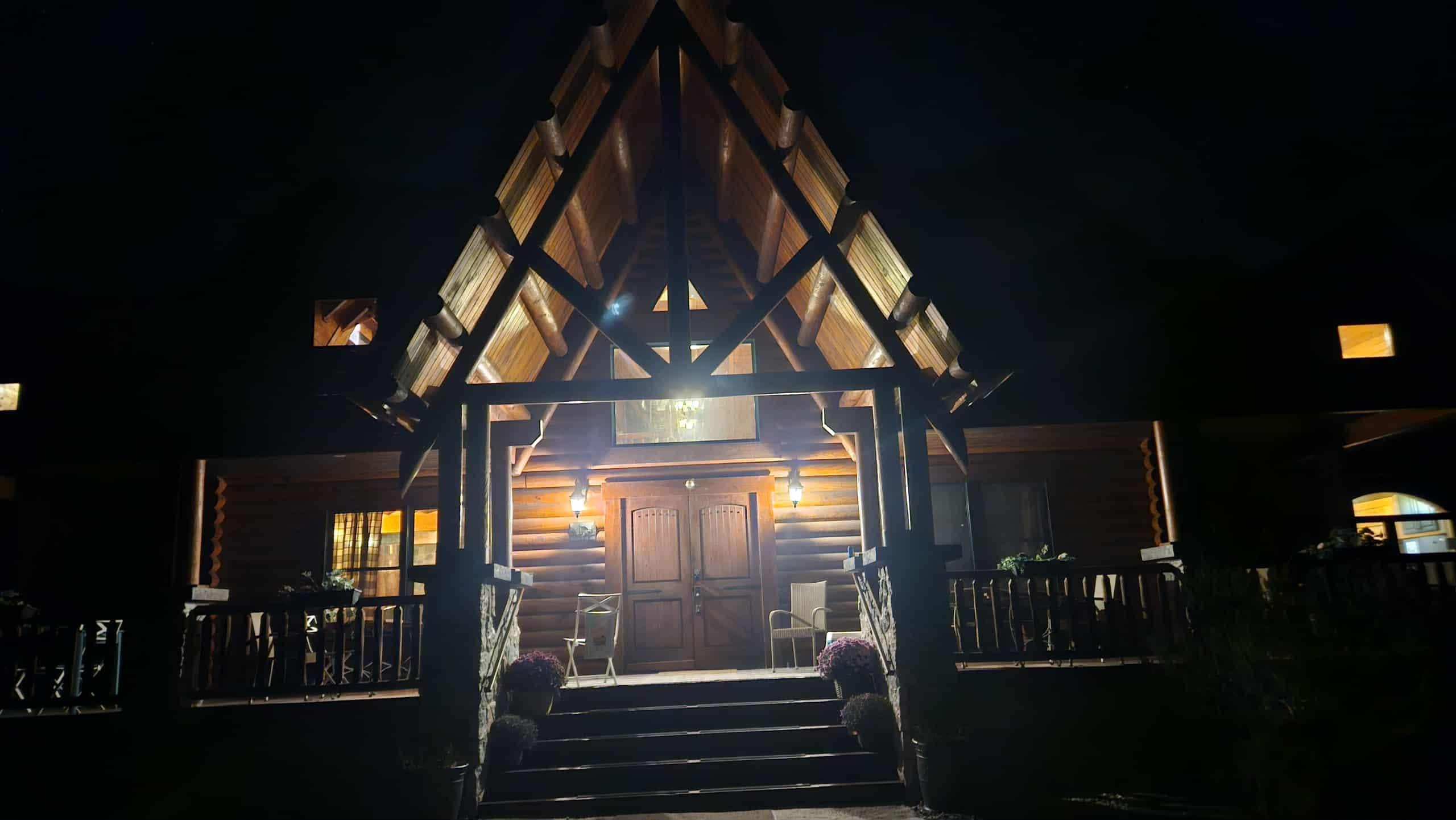 Night shot of the front of the house