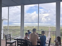 Outdoor seating was a nice accommodation. Great place for meals, games, reading, and more. Screened in prevent many bugs, creatures, and some weather. Sturdy furniture.