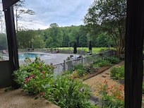 View of the field and pool area from the restaurant terrace.