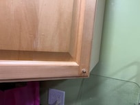 Missing door knobs on kitchen cabinets