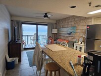 Kitchen and living area looking out to ocean.