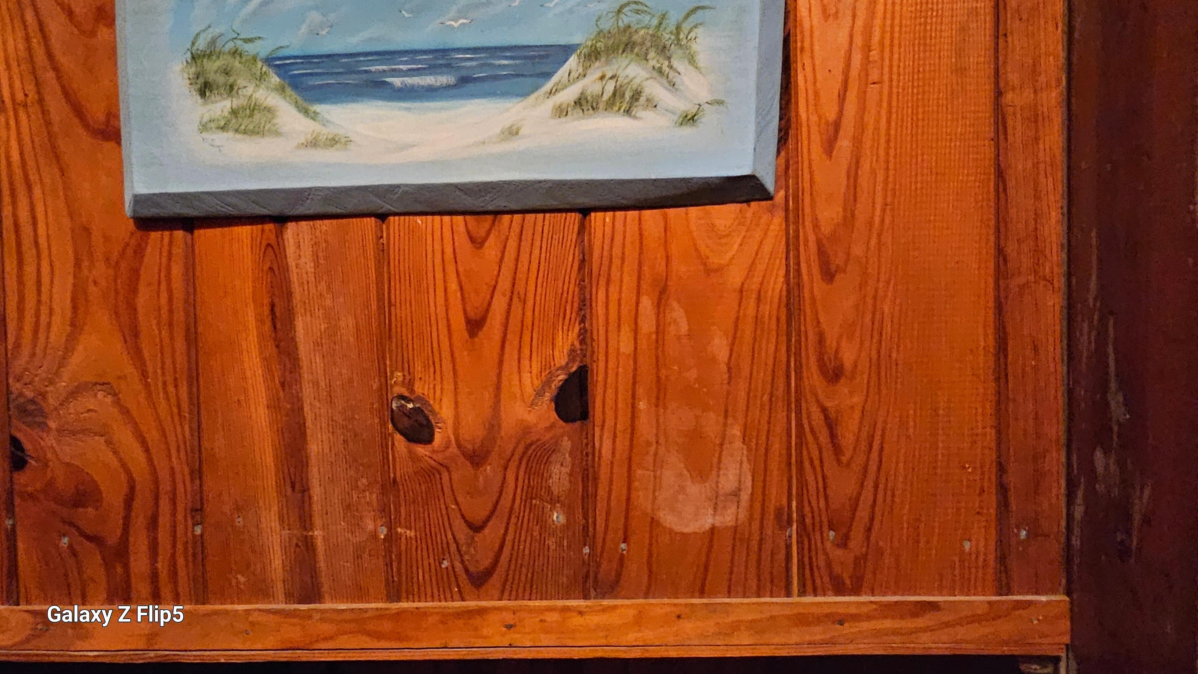 Stained, damaged walls. Dirty. Layers of dust.