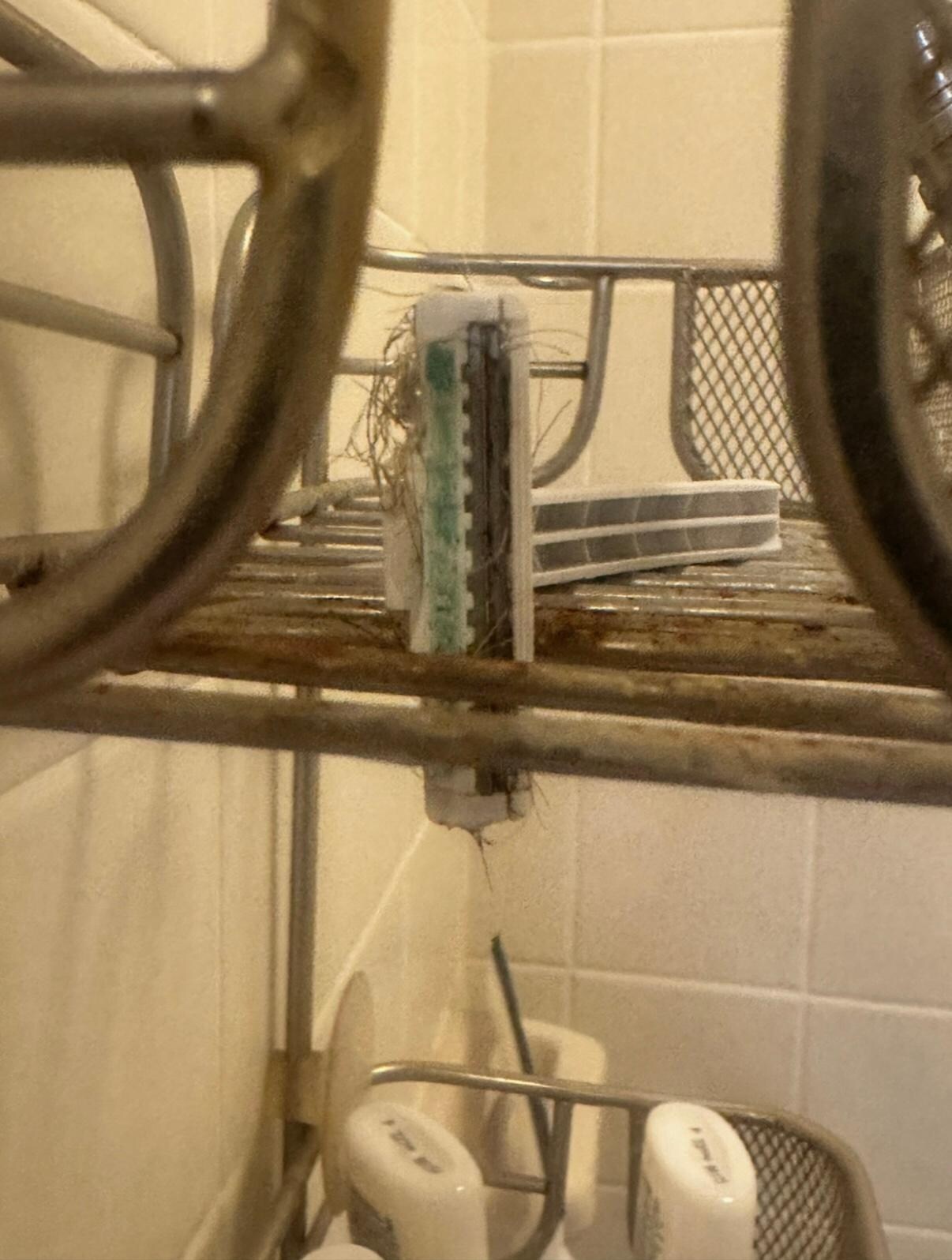 Nasty razor in shower.