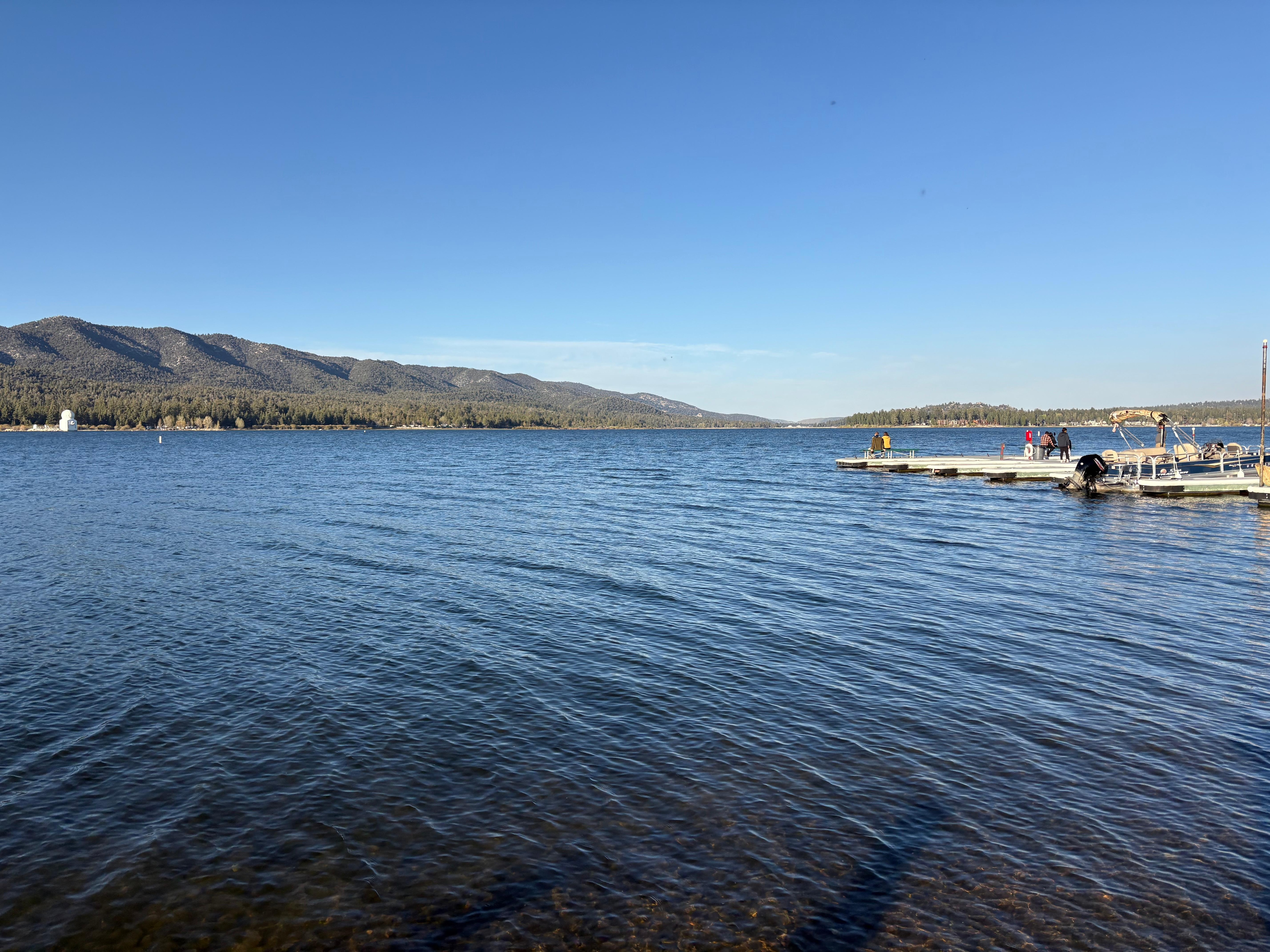 Dock and lake at hotel. 