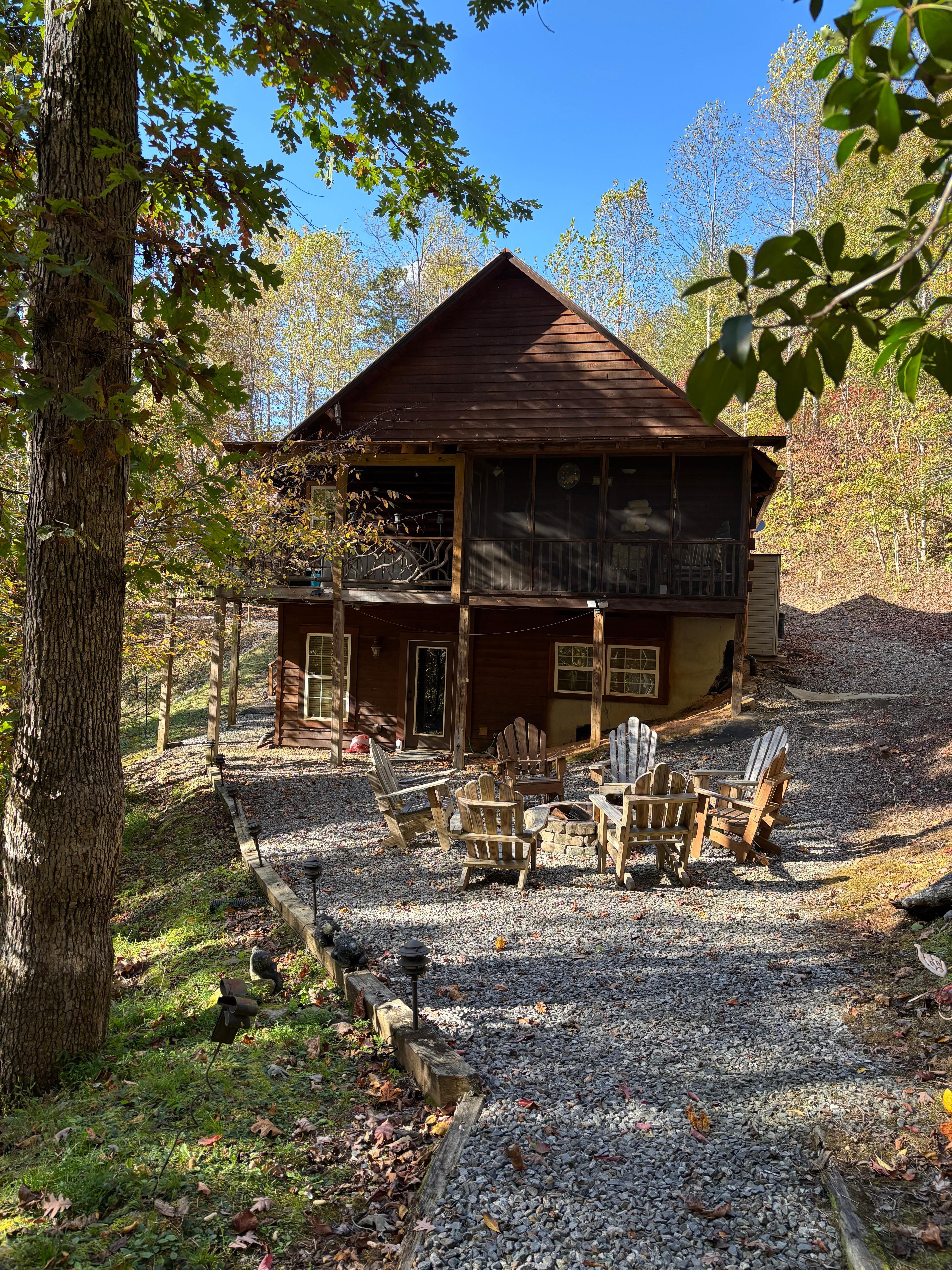 View from small deck of back of house. Great fire pit!