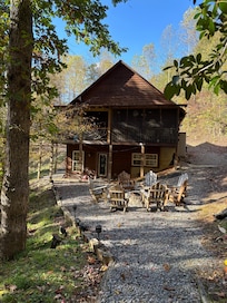 View from small deck of back of house. Great fire pit!