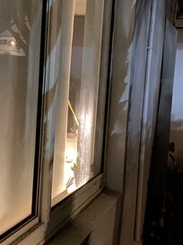 Direct view of the bed inside from the main public walkway outside