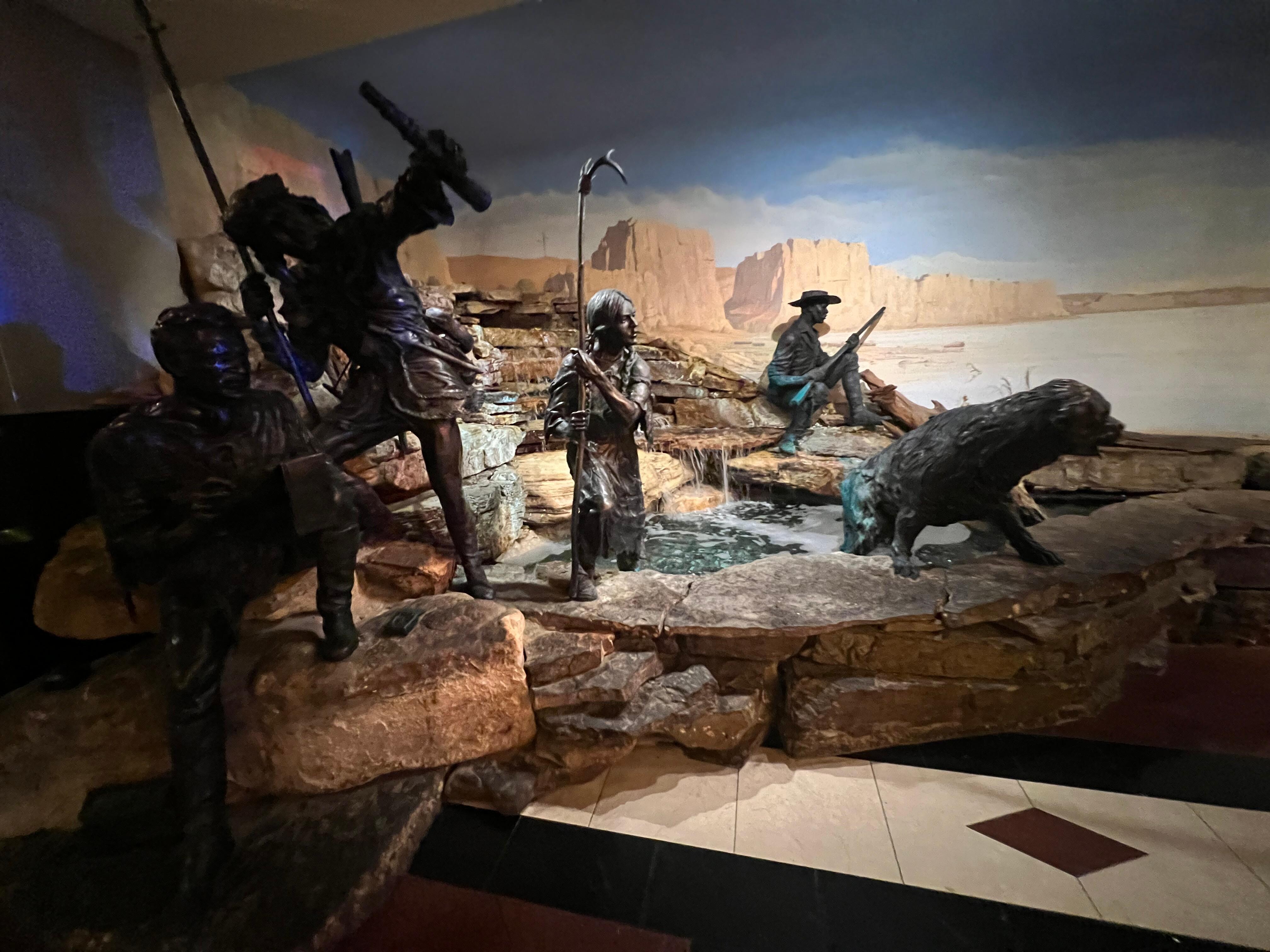 Statues and water feature in lobby.