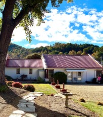 View of back of motel from shelter.