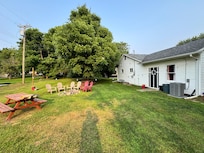 Fire pit and sitting area in the back