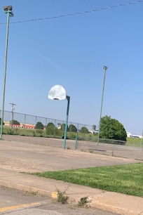 Old run down basketball and tennis space with trailers