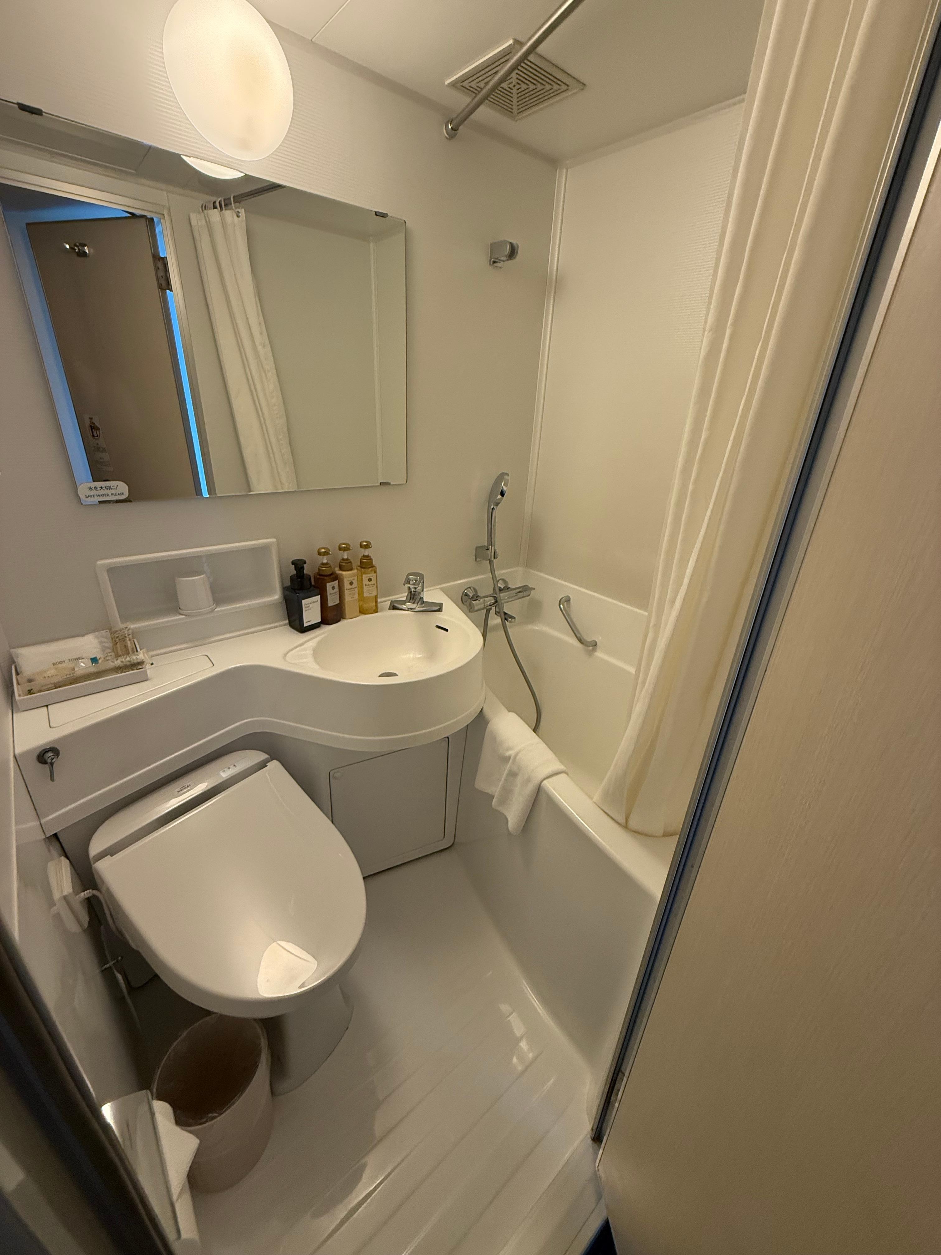 Shower Room with bathtub and toilet with washlet