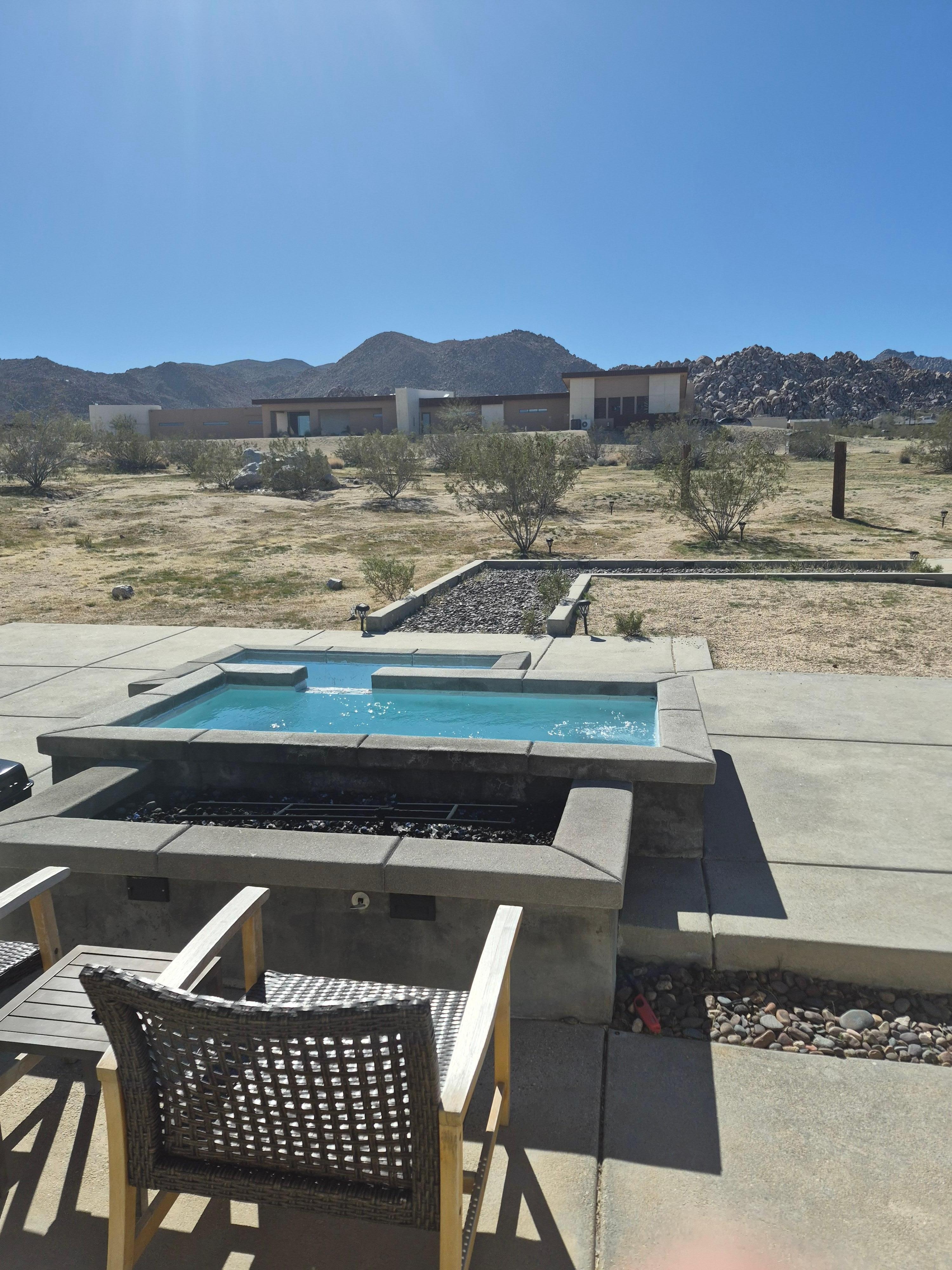 You can sit in the hot tub and watch the sun rise over the distant mountains. Very inspiring.