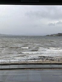 The photo doesn’t do justice to the huge storm raging outside. Great fun watching the waves, the ferries landing, etc