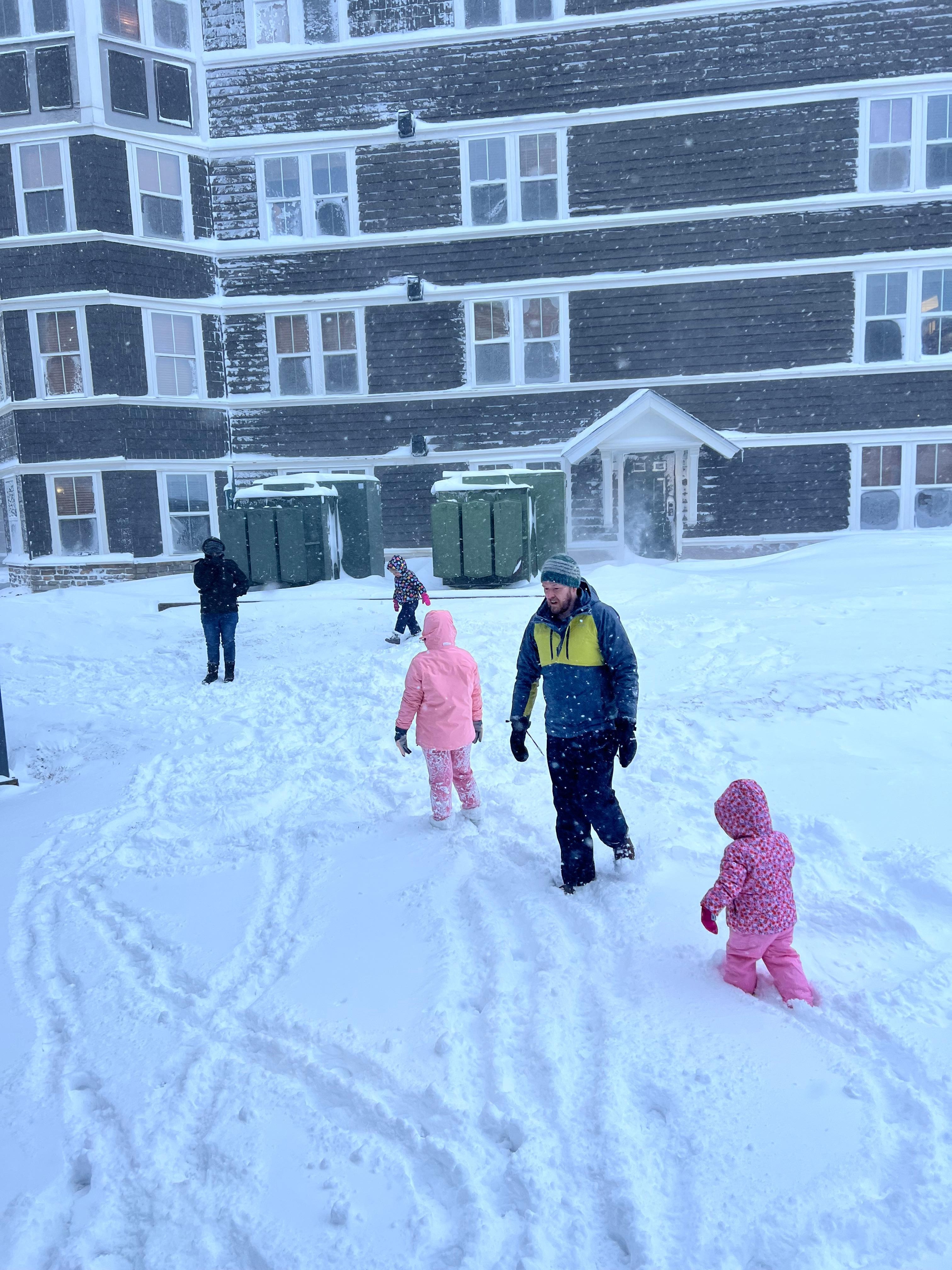 Playing in the snow right outside the room