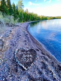 Picture of shoreline and rock art we made together after our engagement