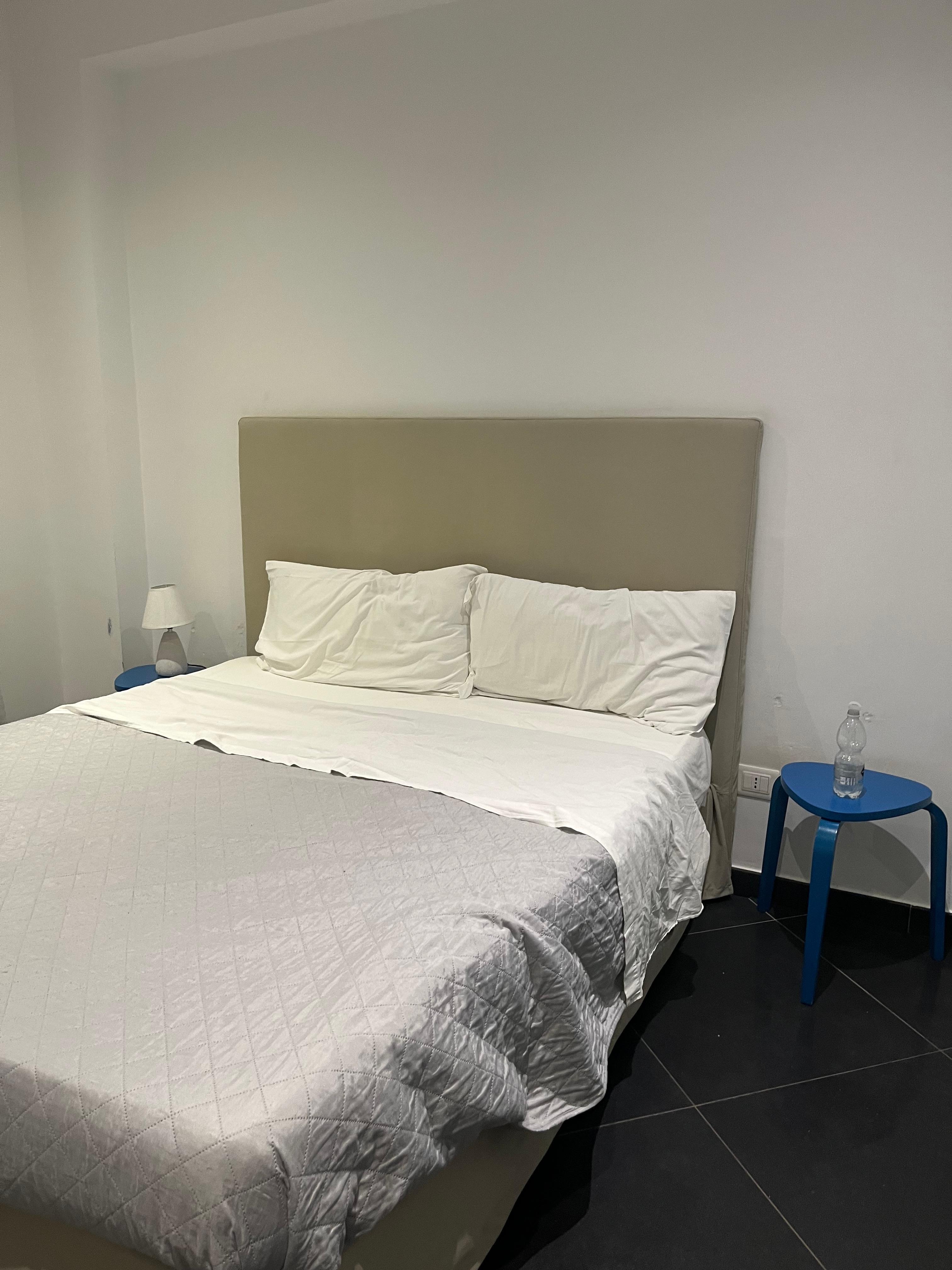 Bed with one side lamp