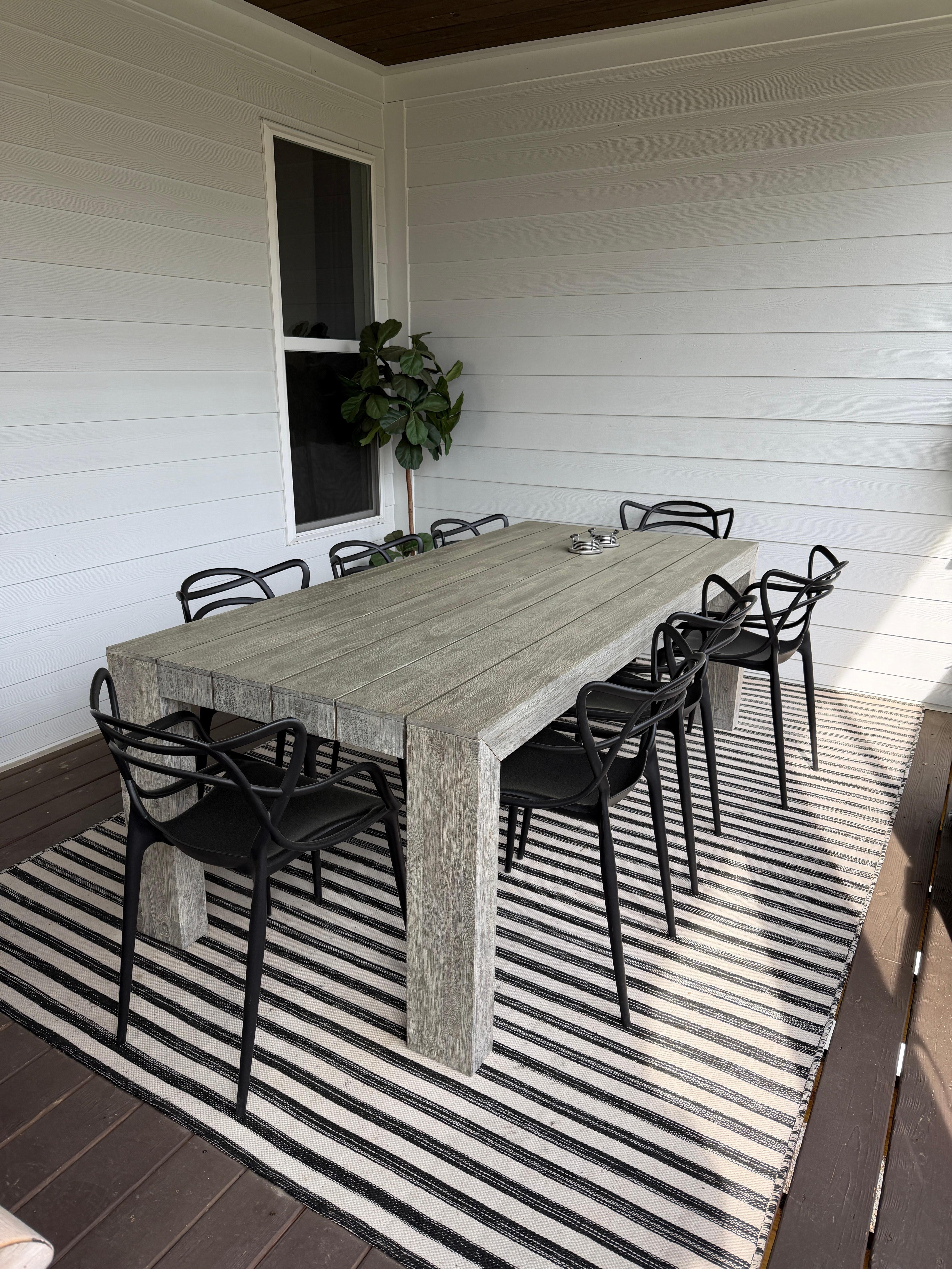 Screened porch dining area.