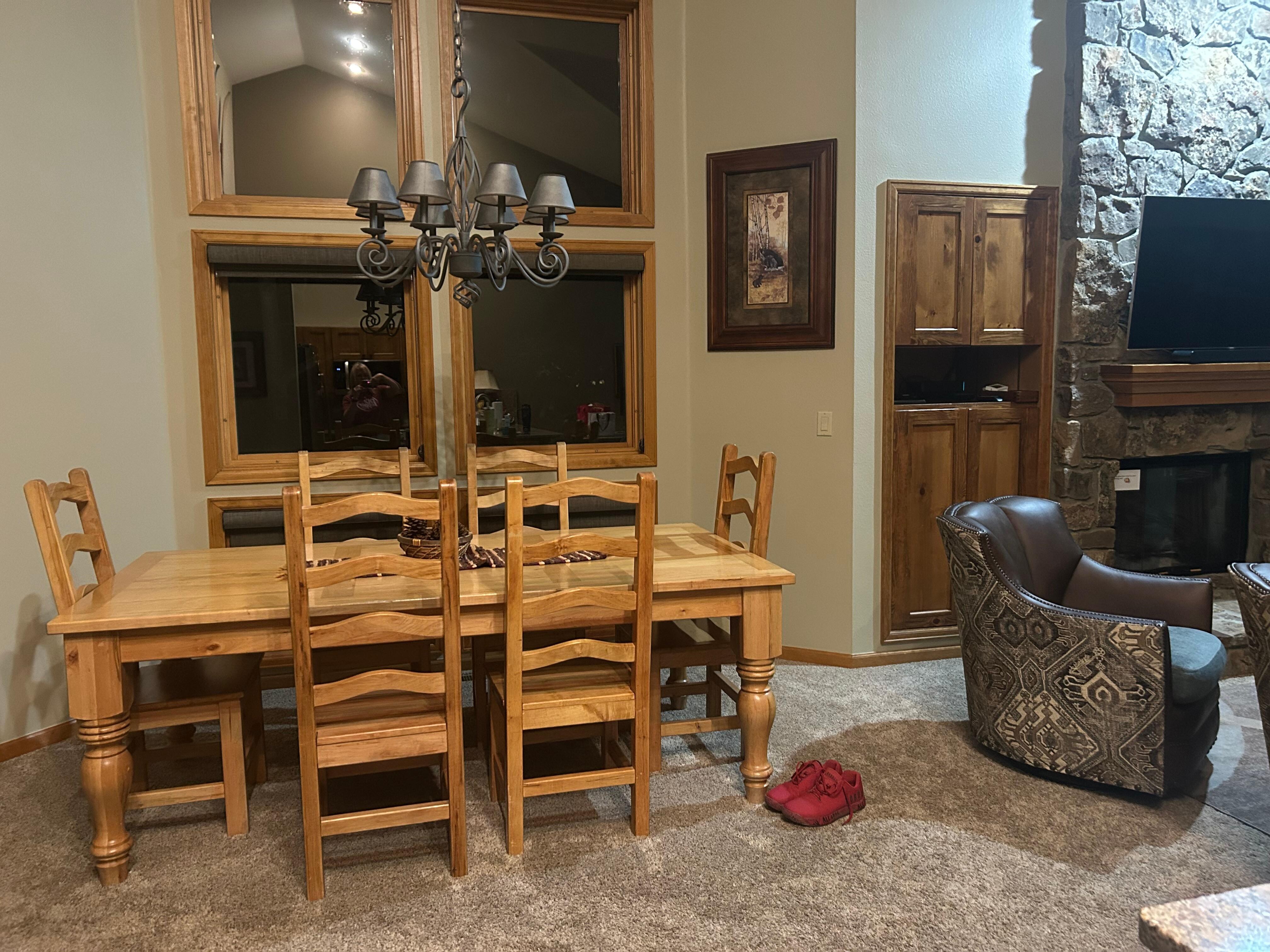 Dining room table for six, there is also   four bar stools.
