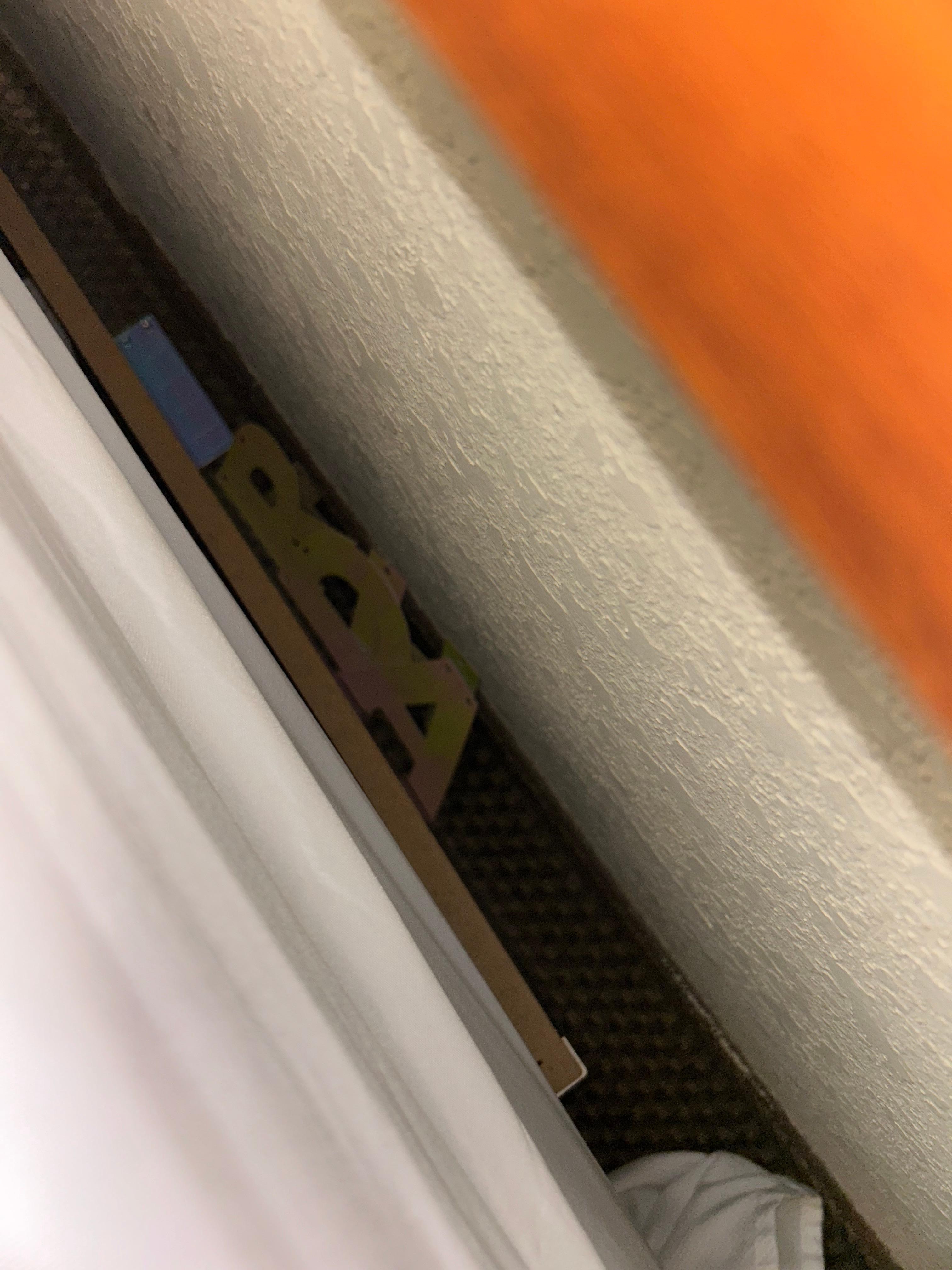 Birthday banner left behind the bed 