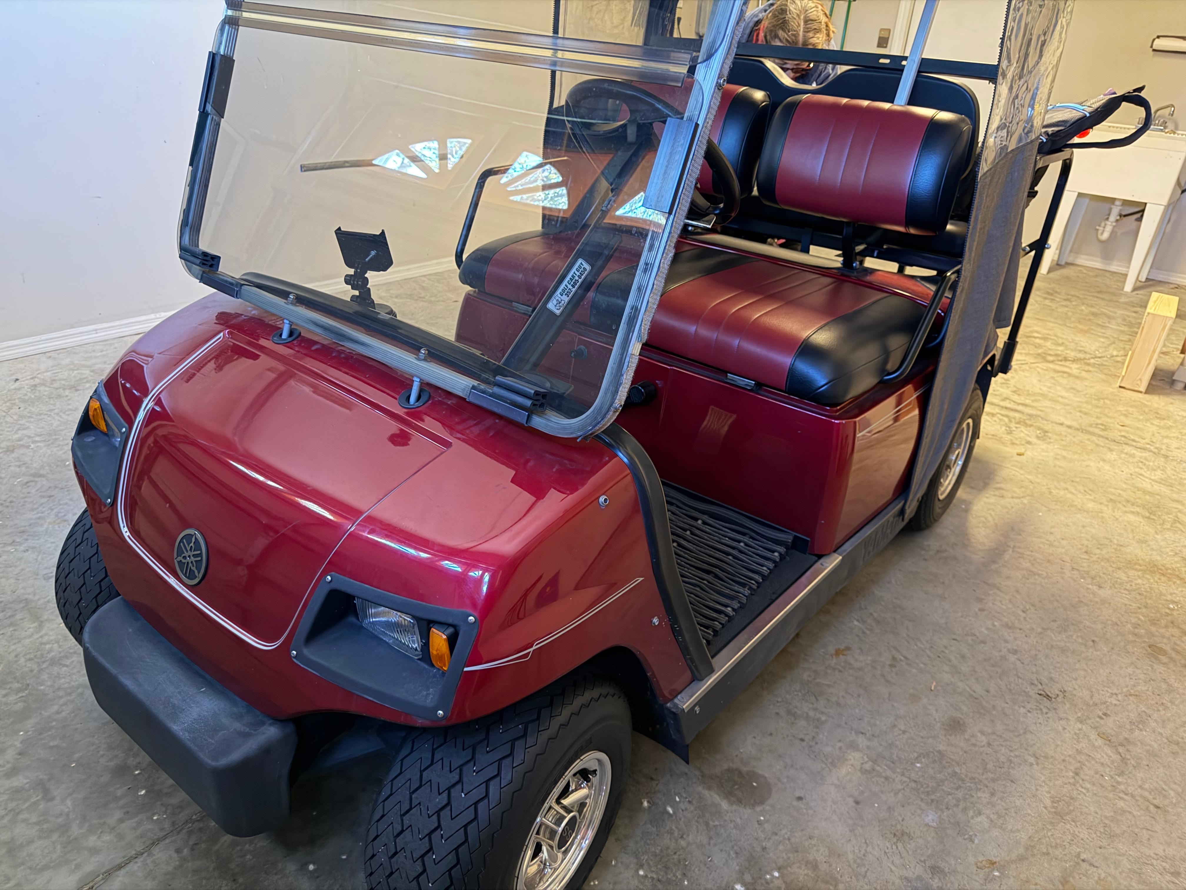 A nice Yamaha Golf Cart at this home.