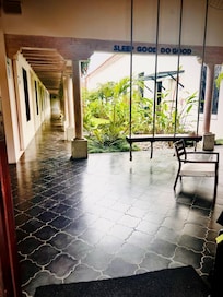 Alluring lobby swing. The Hotel is on a serene street close to everything.