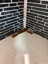 Old Ant bait on kitchen counters.