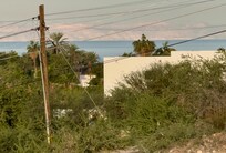 Zoom in of view toward water