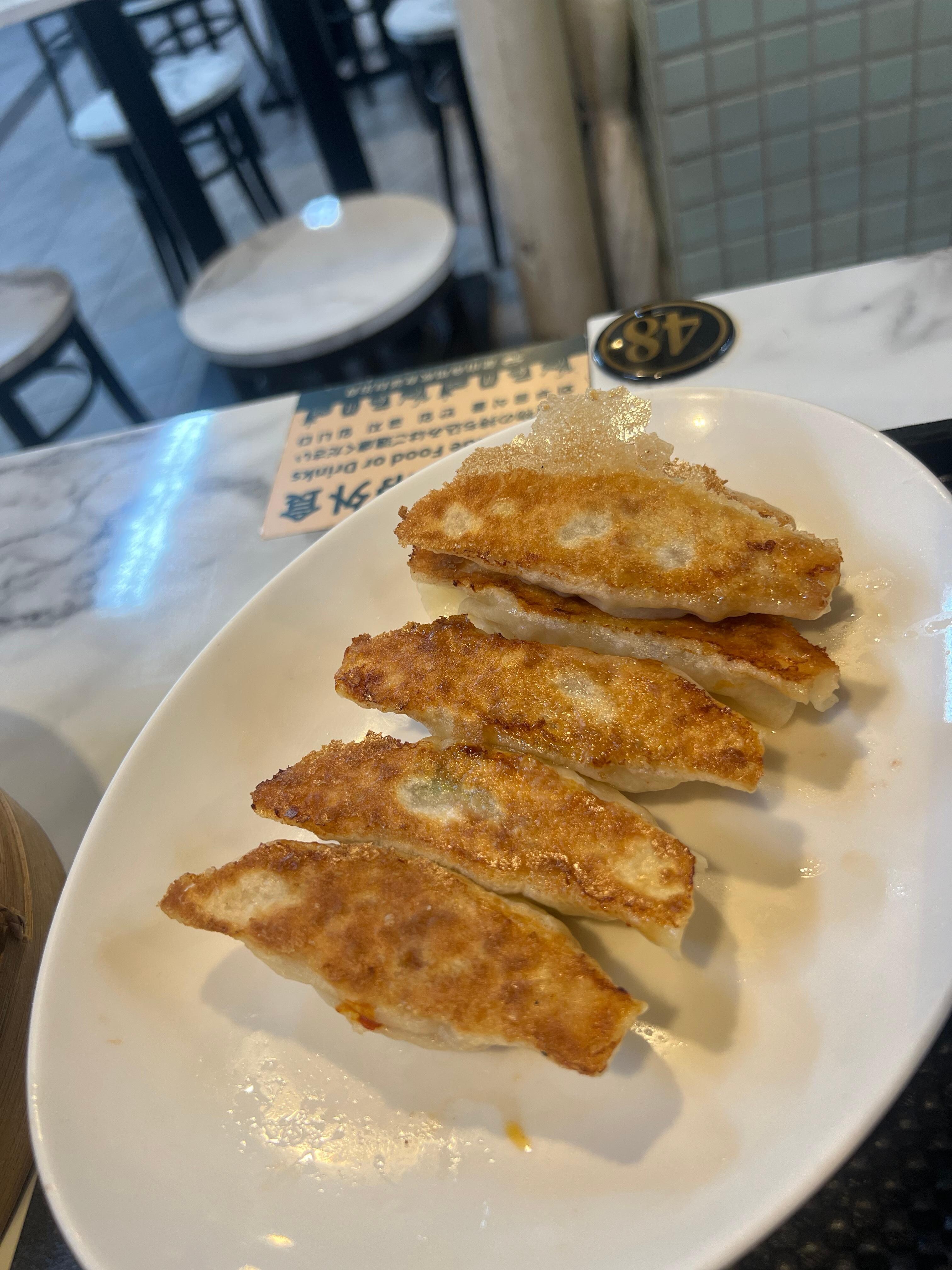 Freshly handmade pan fry Scampi dumplings 
The Masterchef is amazing
