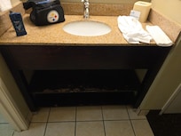 The newest thing her is the soap and lotion dispenser The wood needs to be repainted or updated.