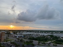 Bay view of the sunset outside the front door.