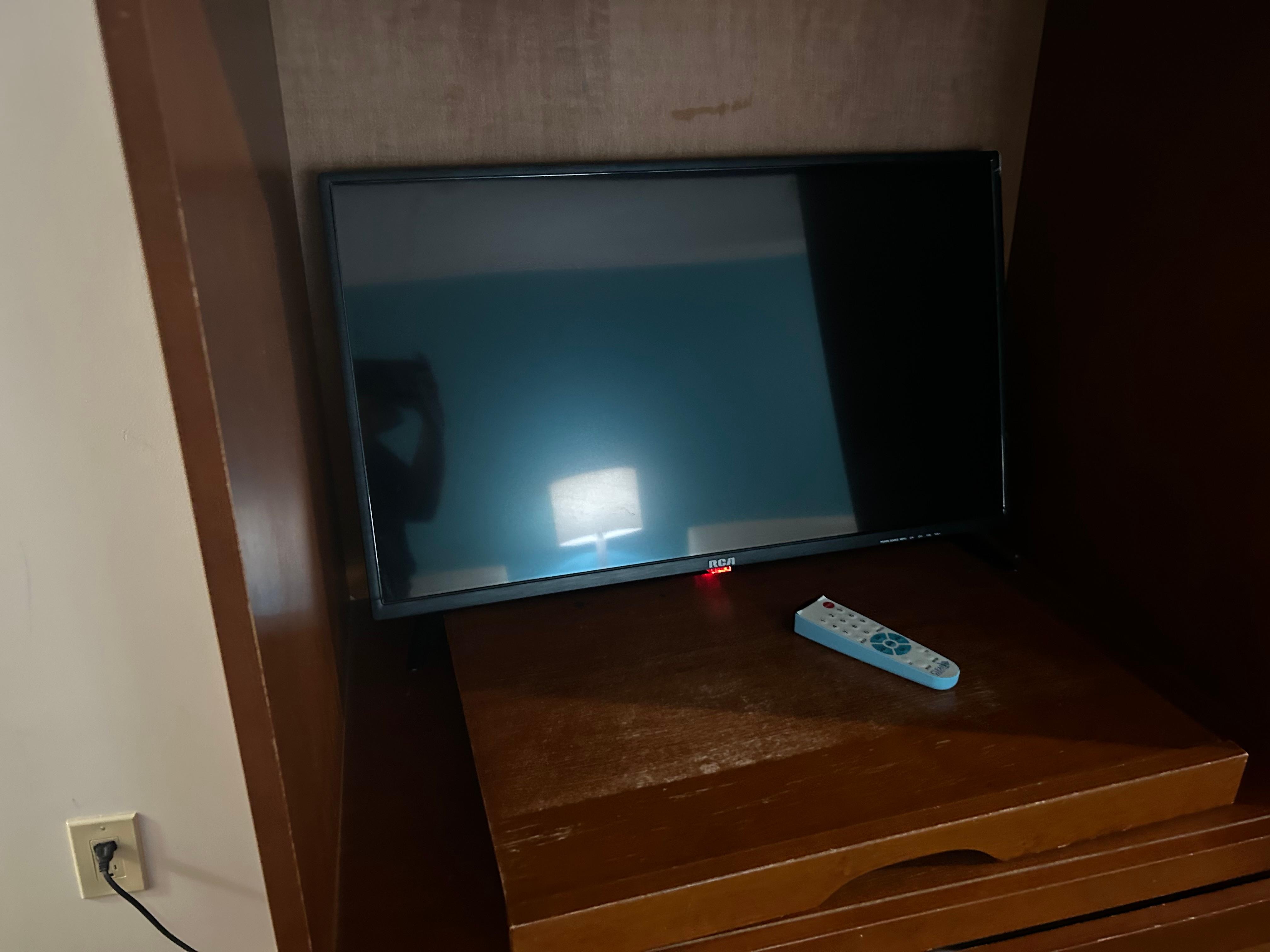 Tv with no stand at all on a slant .