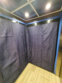 This was the elevator, it had moving blankets taped inside of it. And it made a weird noise when we had to use it