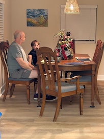 Enjoying breakfast in open dining room to the kitchen.