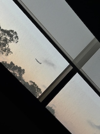 Laying in bed while watching the planes come in, is pretty cool.