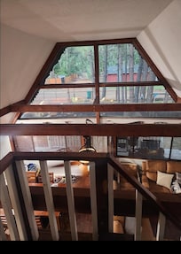Loft view into the livingroom/dining room