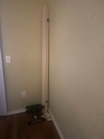 This fell from on the top of the blinds by the Double door in the first room