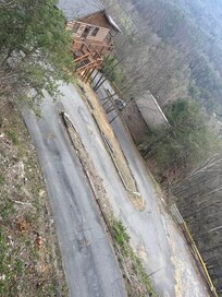 The curvy “driveway”
it’s all the way at the top!