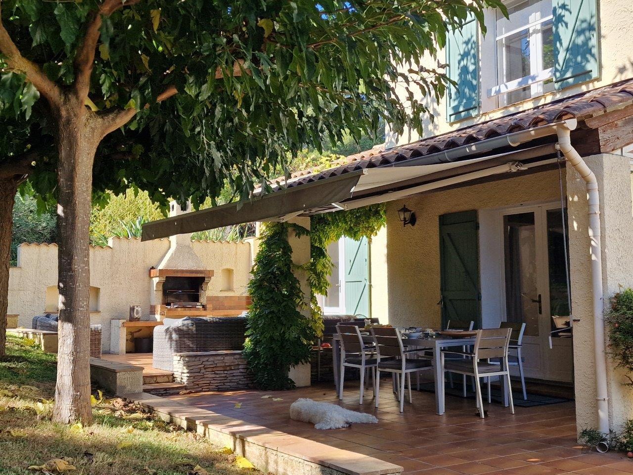 The BBQ terrace/lounge (background) and shady dining terrace are ideal