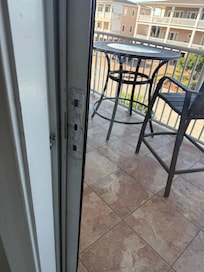 Missing handle and locking mechanism on the door.