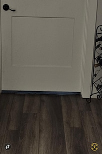 Towel stuffed under master bedroom door to muffle sound. Did not work.